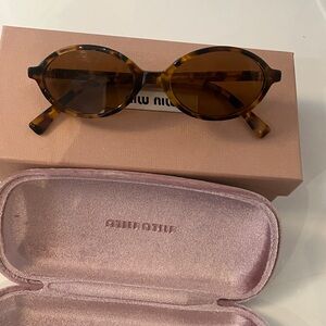 Miu Miu Oval Sunglasses in Havana Brown- MU 04ZS